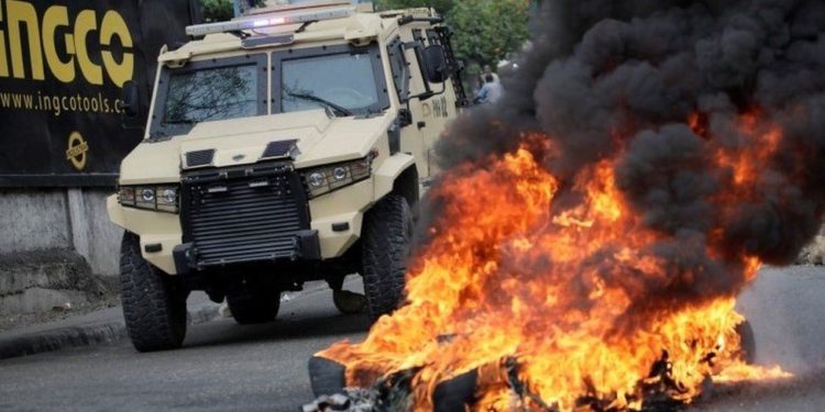 In pictures: Haiti capital’s streets blocked as protests spread